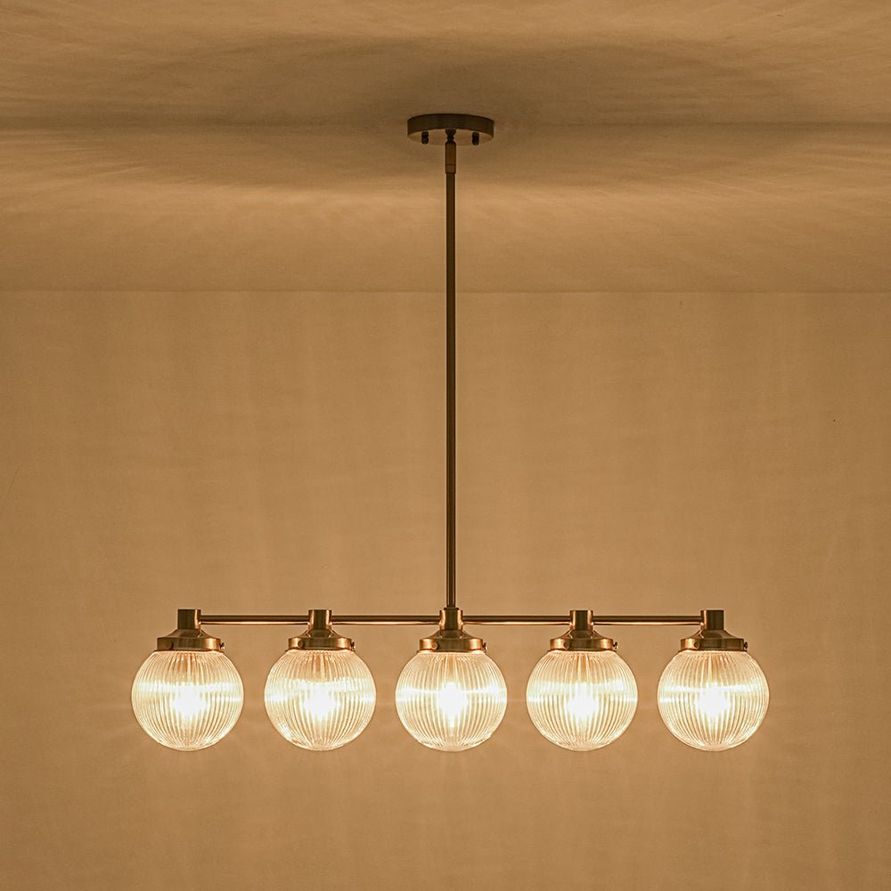 5-Light Brass Ribbed Glass Globe Linear Island Chandelier
