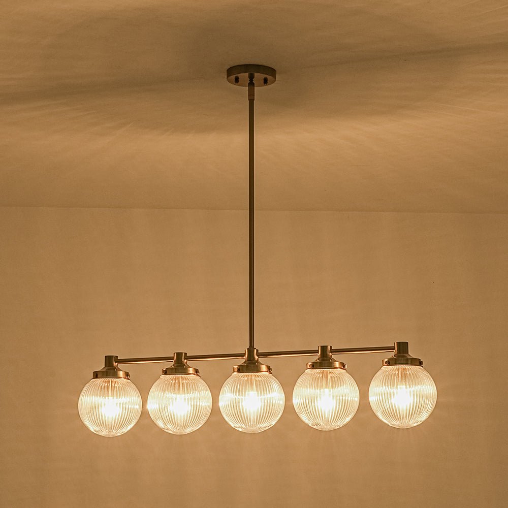 5-Light Brass Ribbed Glass Globe Linear Island Chandelier