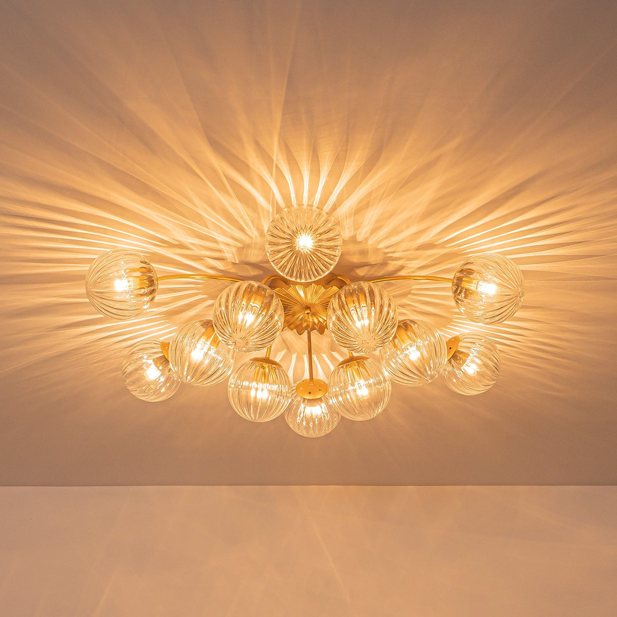 Bloom Brass 12-Light Ribbed Glass Bubble Semi Flush Chandelier