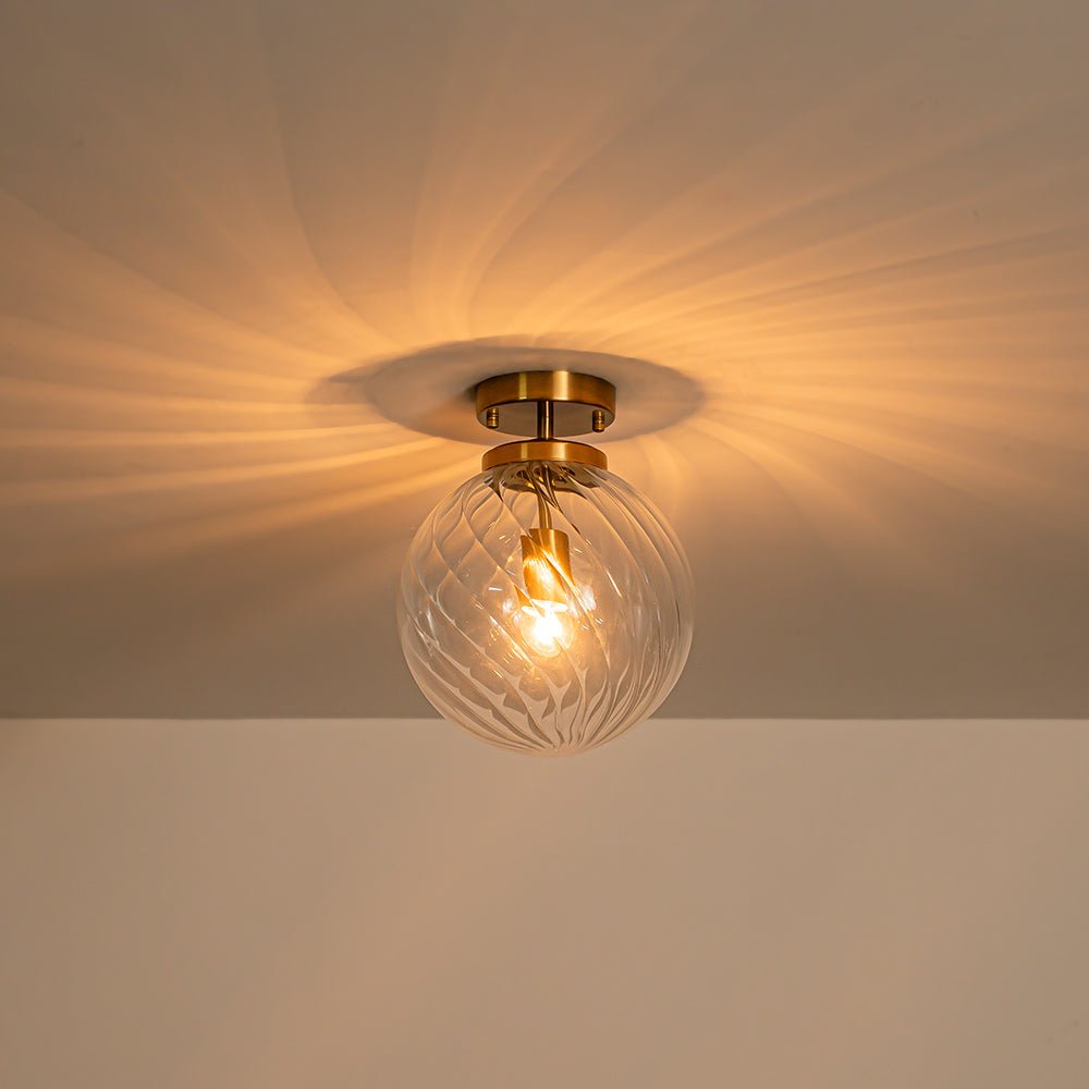 Brass 1-Light Swirling Ribbed Glass Globe Semi Flush Mount