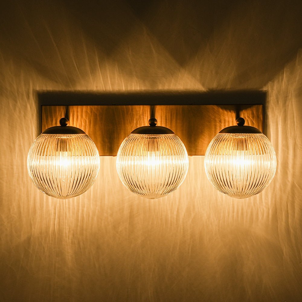 Brass 3-Light Ribbed Glass Globe Bathroom Vanity Wall Lamp
